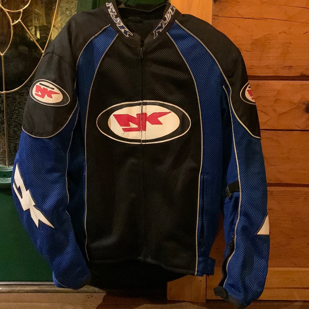 NJK Leather Motorcycle Riding Jacket with protective shell and padding.